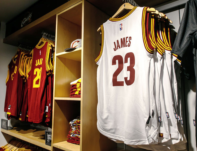 77284689 - new york, february 21, 2017: replica jerseys of lebron james of cleveland cavaliers on sale in the nba store in manhattan.